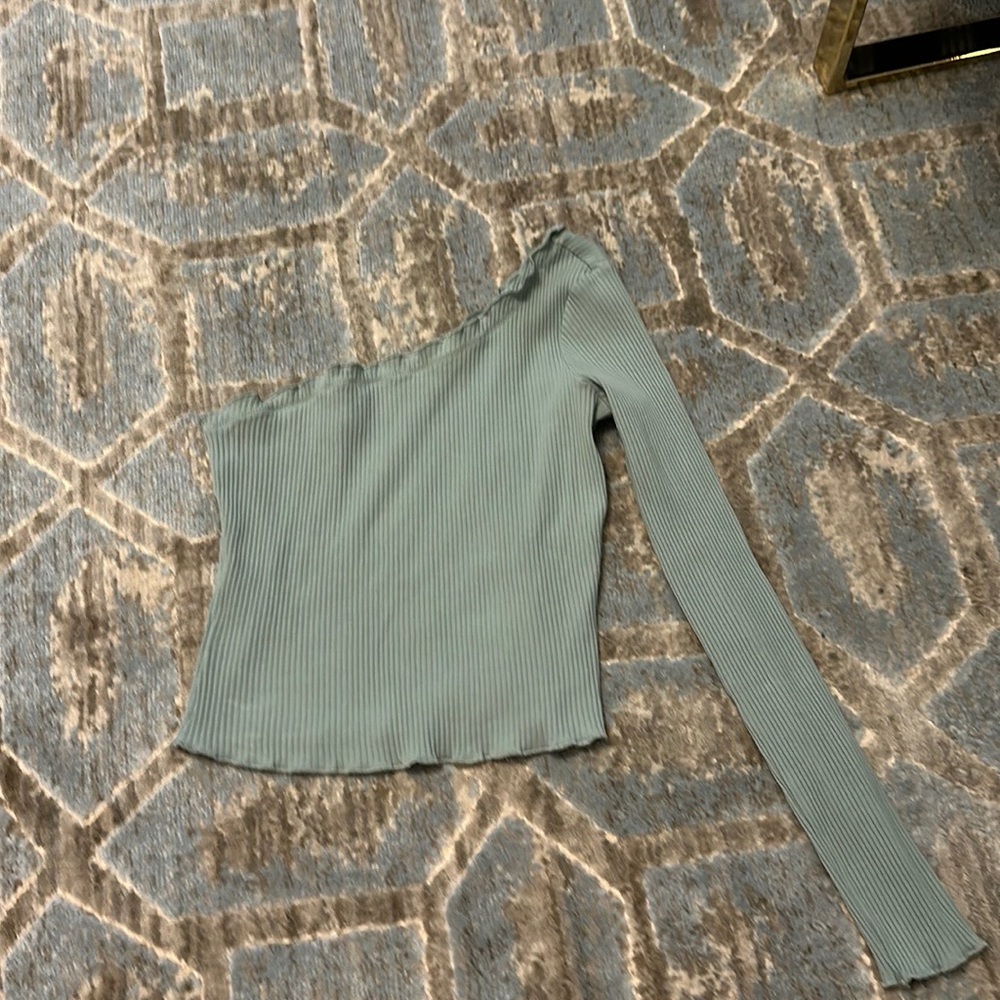 One sleeve green top